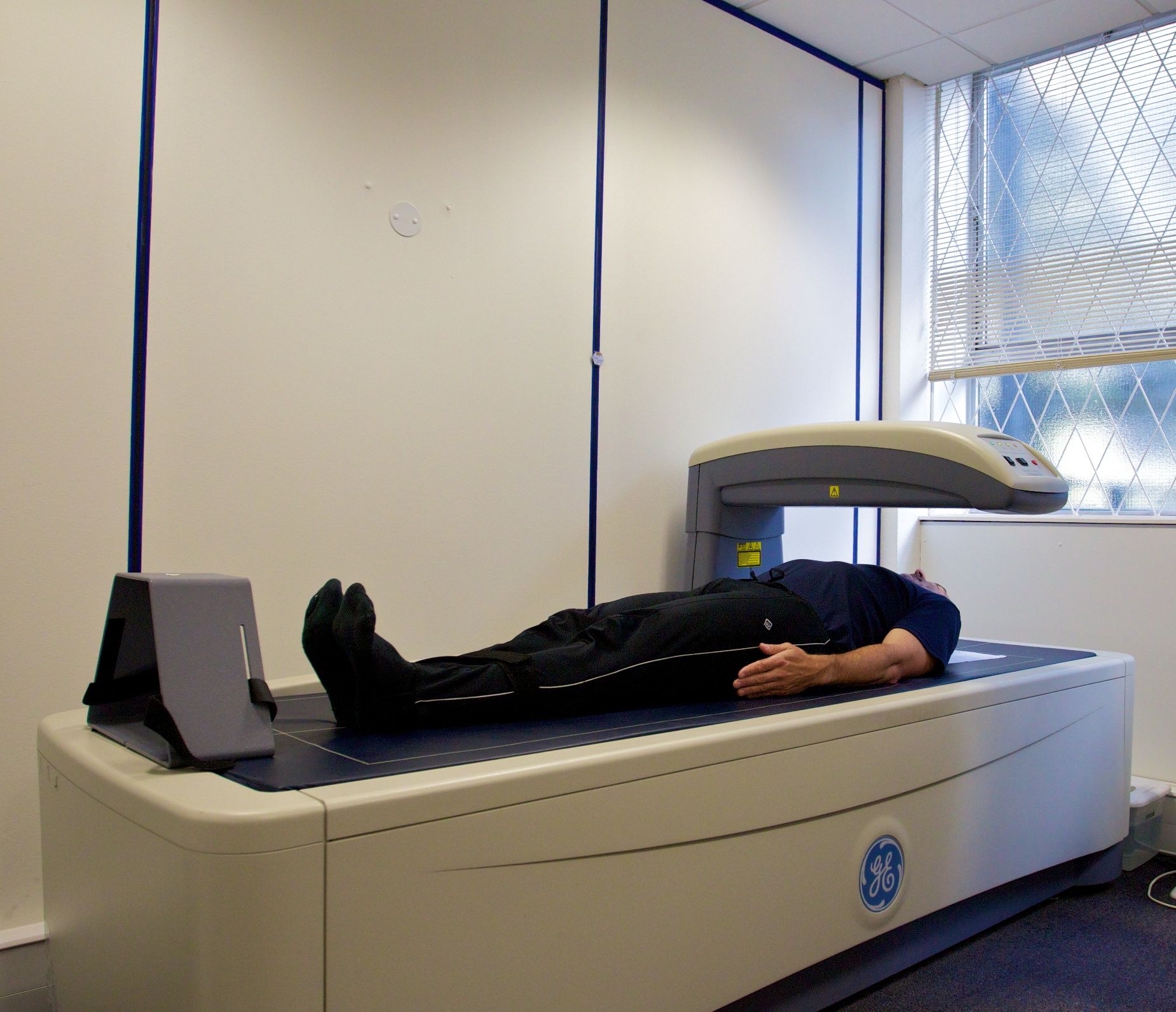 State-of-the-art DEXA imaging equipment in a clinical room
